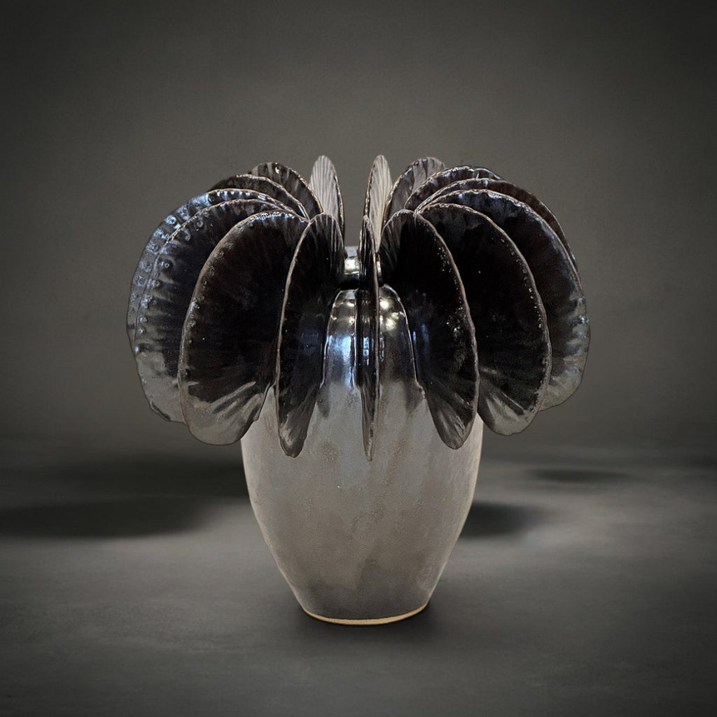 Fin Vase Medium — pale grey ceramic vase with bronze metallic glazed fins fanning from the rim, HMT Home