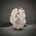 Leaf Vase — matte white ceramic vase sculpted from furled veined leaves, HMT Home