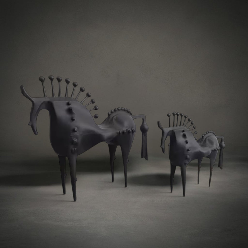 Nero Horse Sculpture in large and small together — stylised matte black horses with elongated legs and spined pin manes, HMT Home