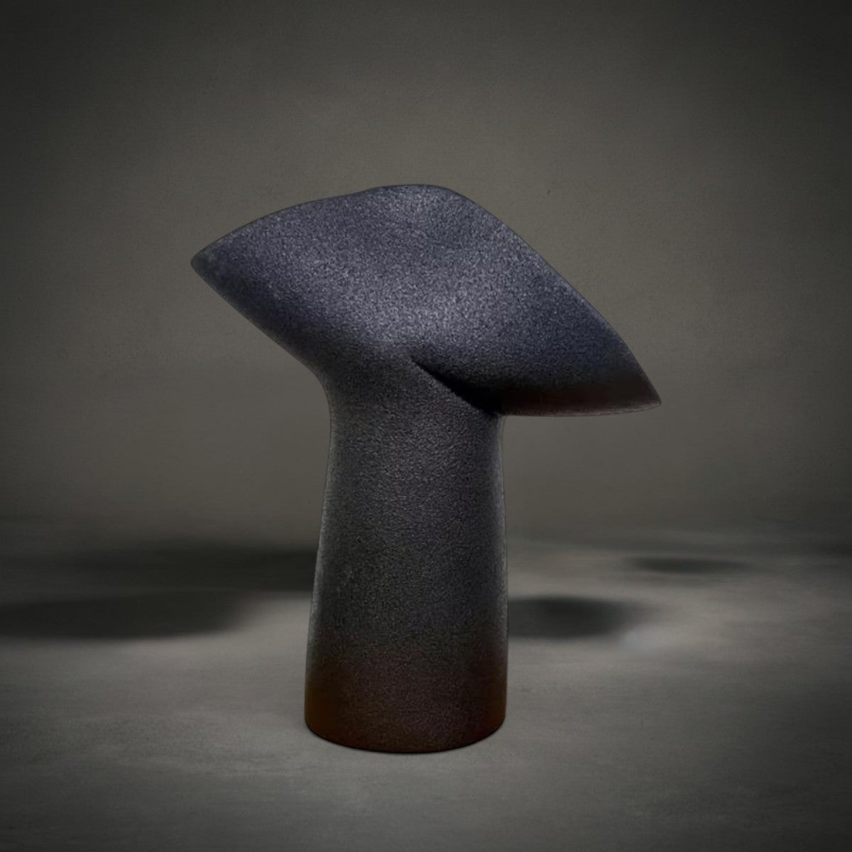 Whale Tail Sculpture — abstract whale fluke in dark speckled stone finish, HMT Home