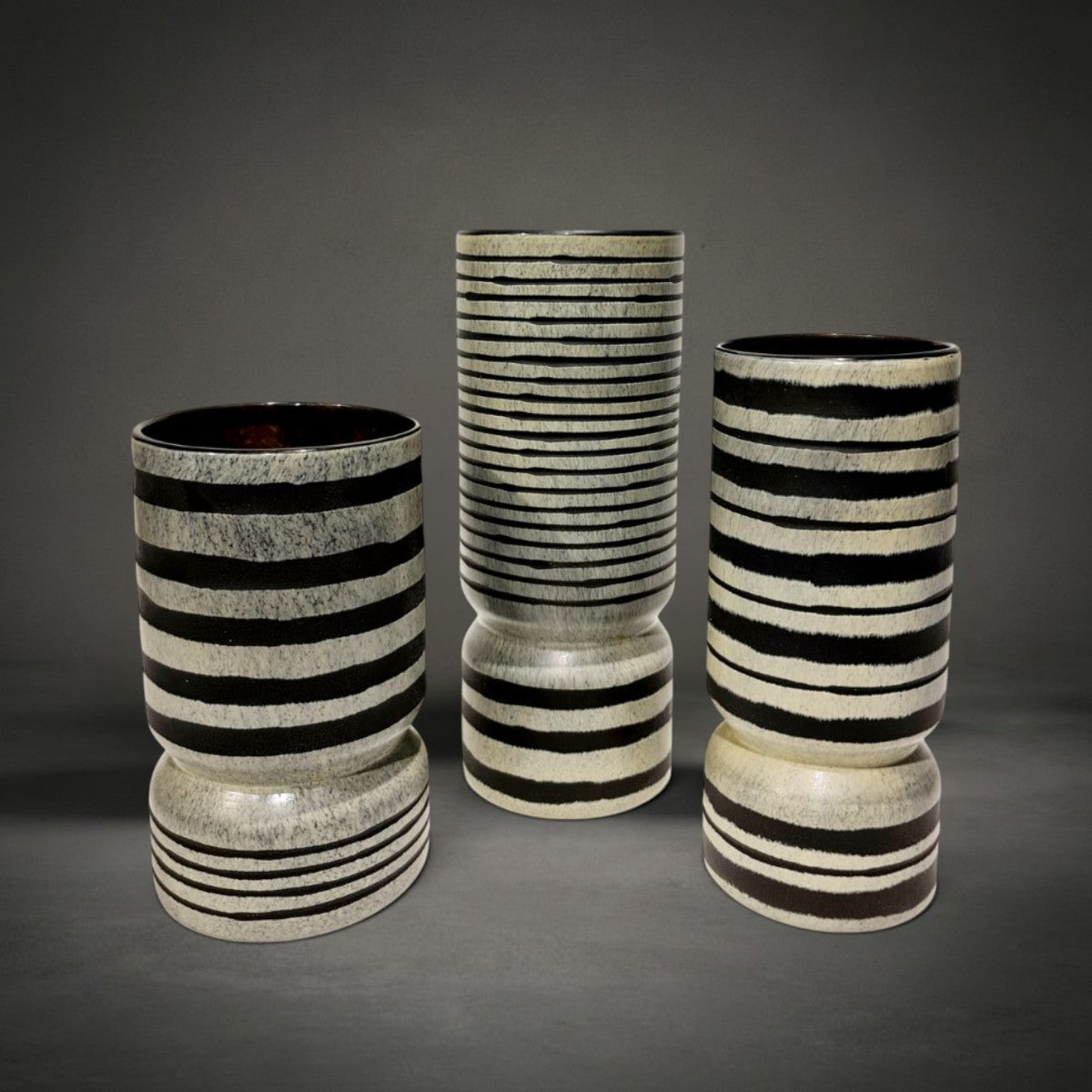 Zebra Vase family — large, medium and small black glass vases with stone, grey and beige stripes, HMT Home